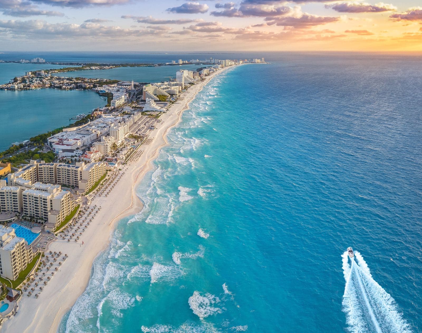 Aerial view of the Cancún coastline at sunset