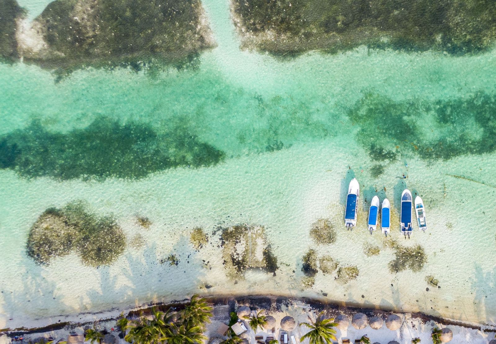 Aerial view of boats over shallow water off Mahahual